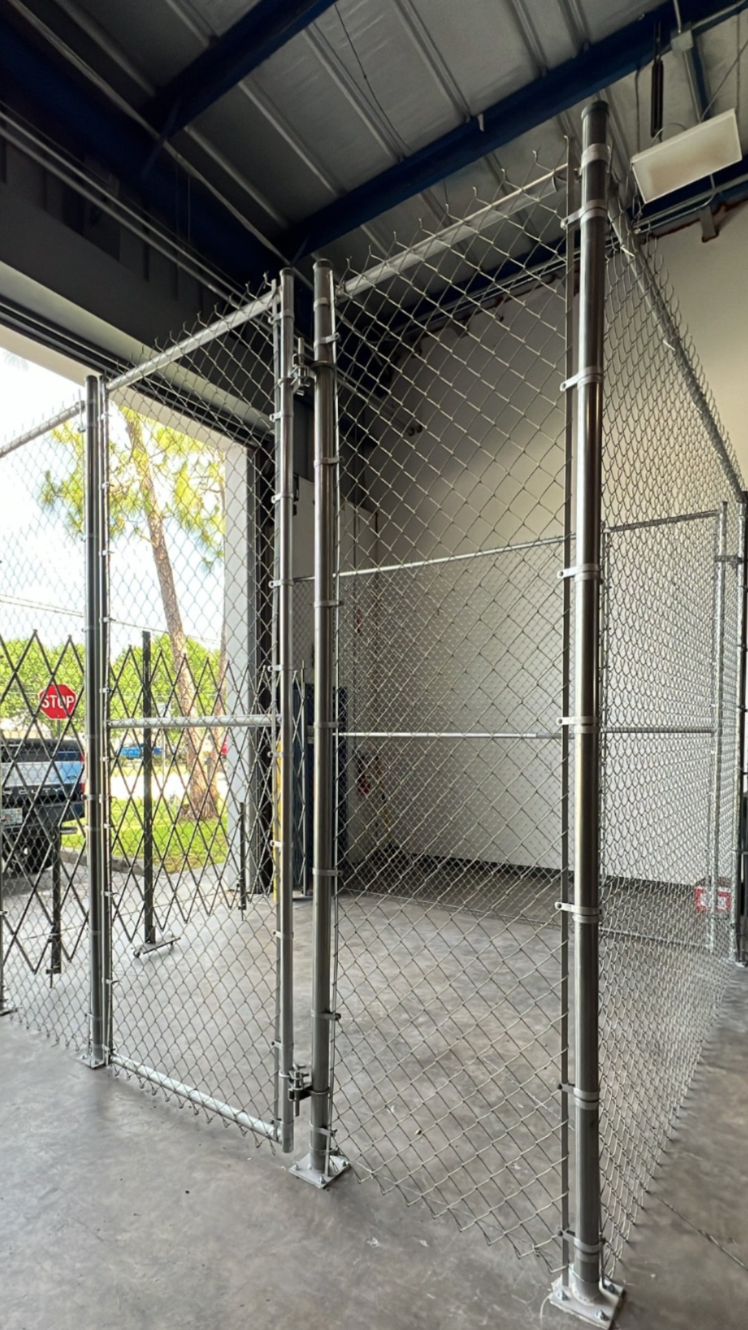 Powder coated driveway gate with decorative ironwork